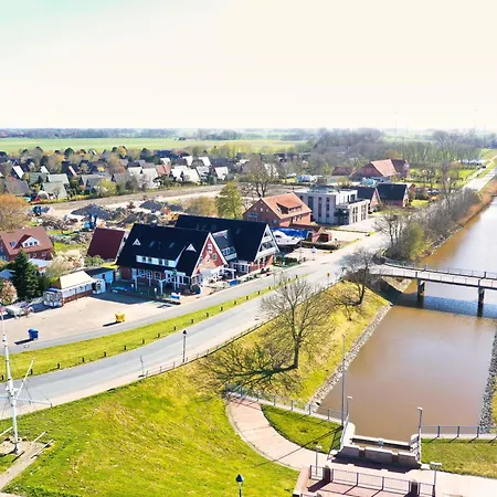 Nurdachhaus Karin Holiday home Butjadingen
